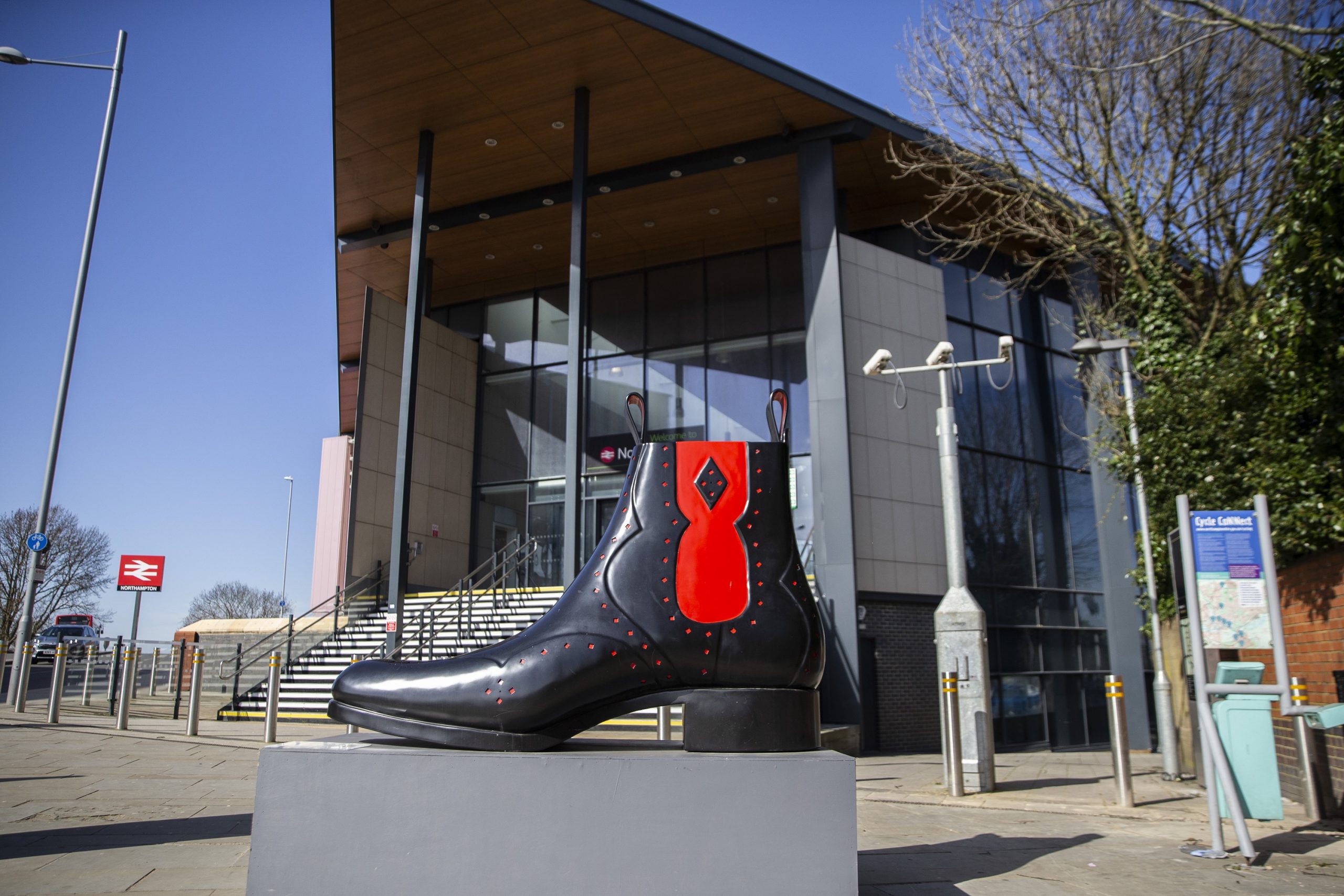 Shoe outside Northampton train station - transport and connectivity