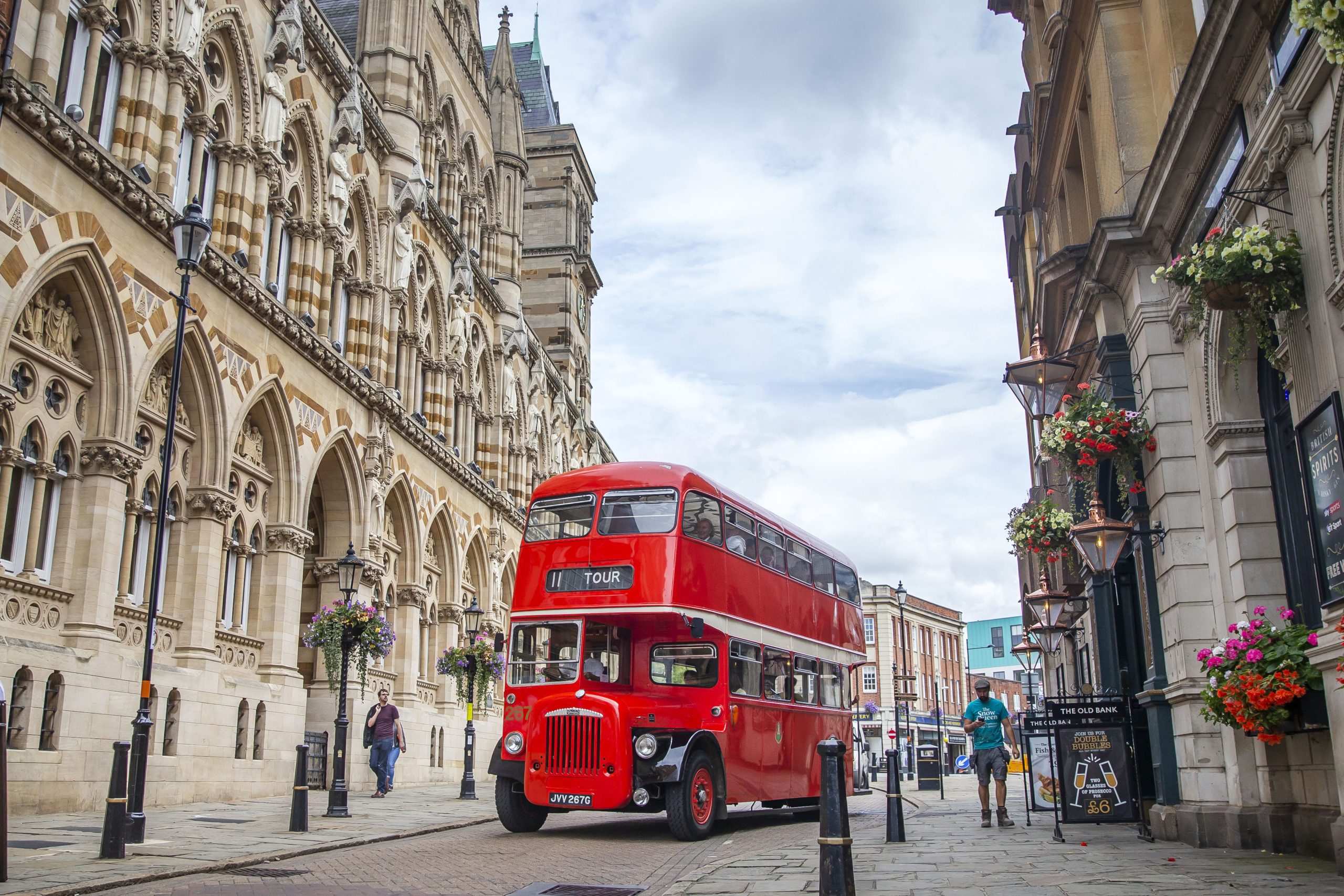 Image of the Guildhall with the Heritage Red Bus in front
